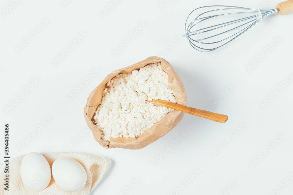 Flat lay composition with paper bag of organic flour