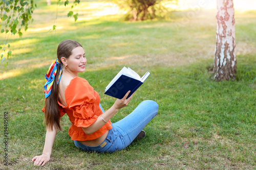Beautiful young woman readi...