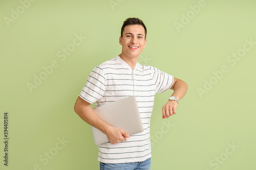 Young man with wristwatch a...