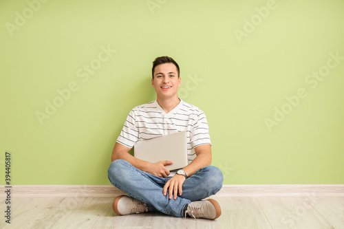 Young man with wristwatch a...