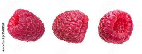 Set of fresh ripe raspberry isolated on a white background. Macro shot. Berries from different angles