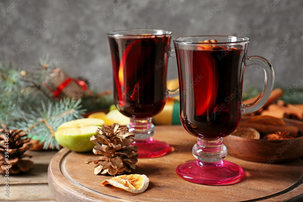 Glass cups of tasty mulled wine on table Glass cups of tasty mulled wine on table