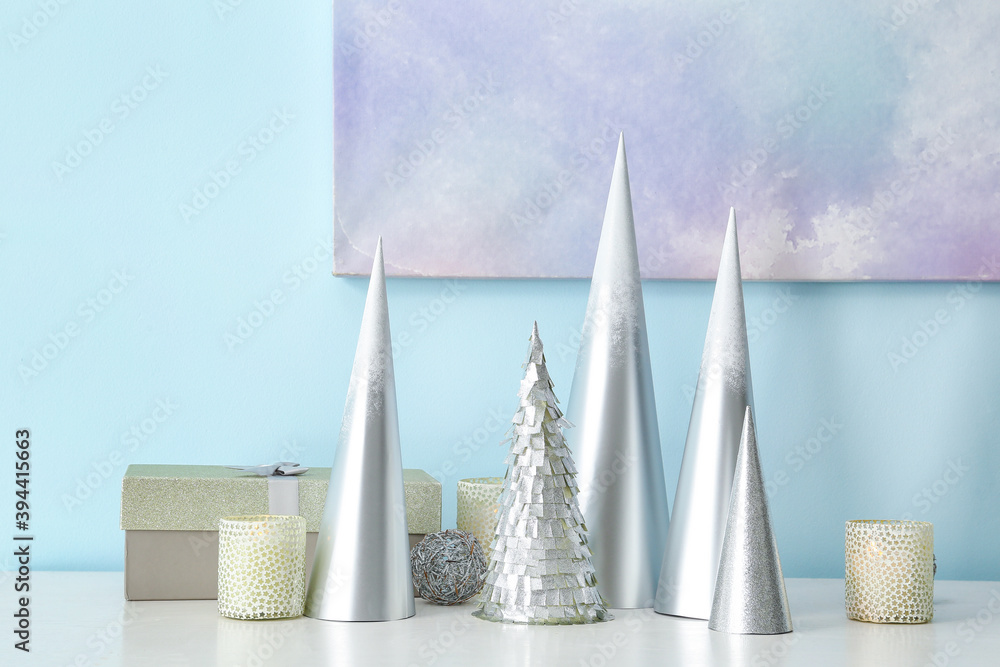 Beautiful Christmas decorations on table in room Beautiful Christmas decorations on table in room