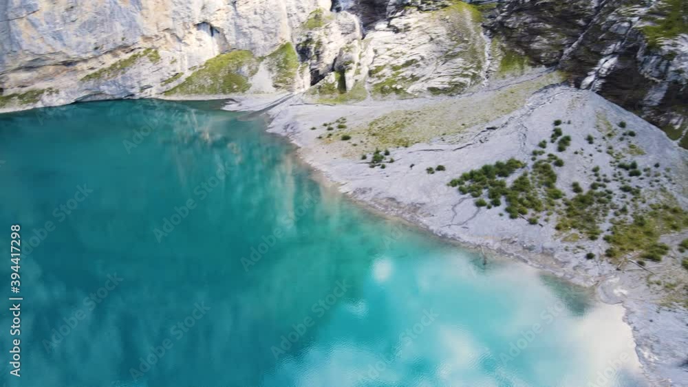 Blue Water. Blue Lake. outdoor and adventure life through the wasteland of a mountain range. Hiking and traveling is a outdoor adventure at the highest mountains of Europe. Blue Water. Blue Lake. outdoor and adventure life through the wasteland of a mountain range. Hiking and traveling is a outdoor adventure at the highest mountains of Europe.