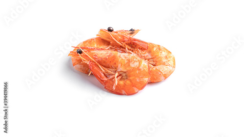 Shrimp in a wooden plate on a white background. High quality photo