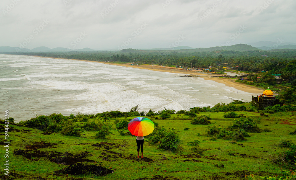 View from hilltop, person on the beach, house on the beach, beach view