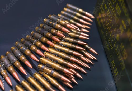 Bulk of bullets suitable for M80/M62 which are linked ammunition consisting of Lake City brass, links, boxer-primers and projectiles on a black background.