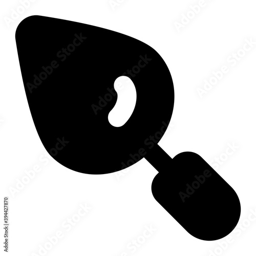 
A small hand held shovel tool for digging and applying material, solid icon
