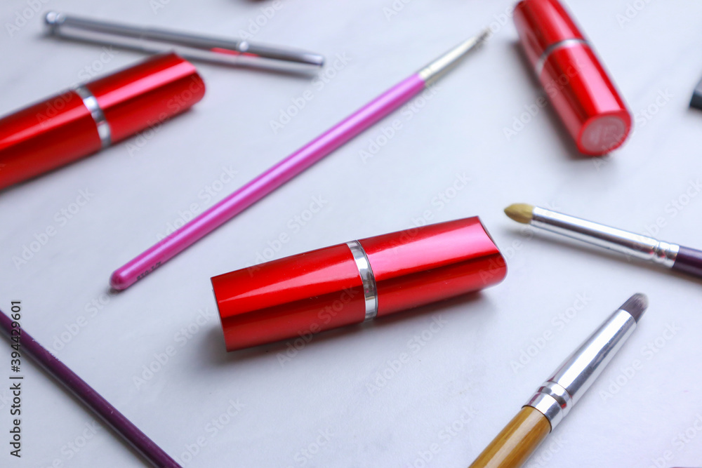 Set of decorative cosmetic on light background Set of decorative cosmetic on light background