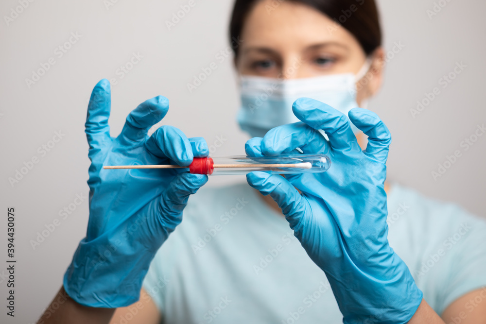 Medical healthcare nurse holding Coronavirus COVID-19 swab test kit ...