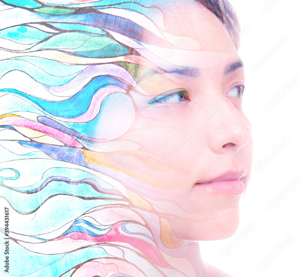 A young beautiful brunette's profile portrait combined with an abstract colorful art