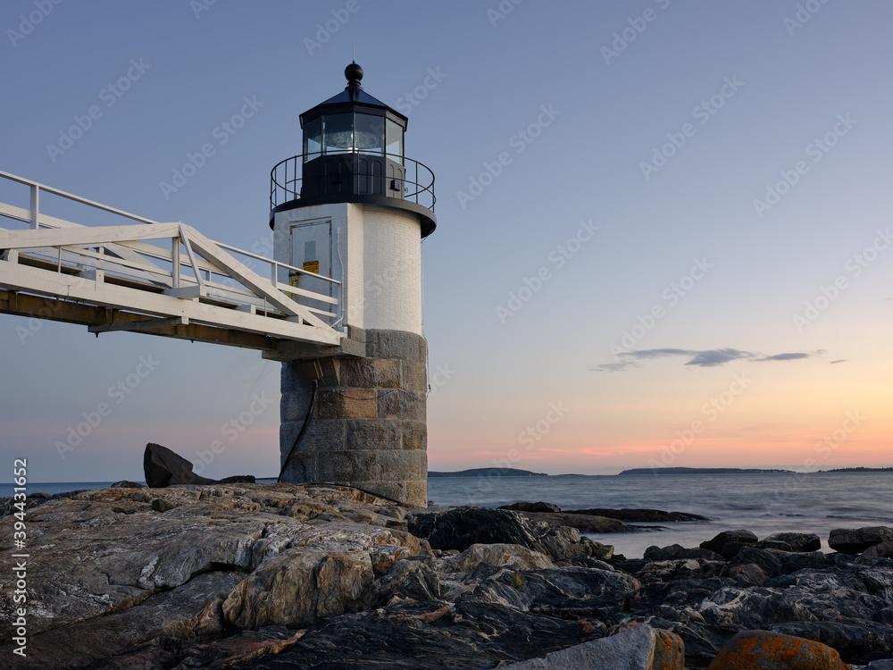 The Marshall Point Lighthouse at the entrance to the St. George river and the Port Clyde fishing village in Maine
