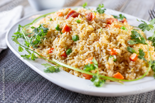 A view of a plate of fried rice.