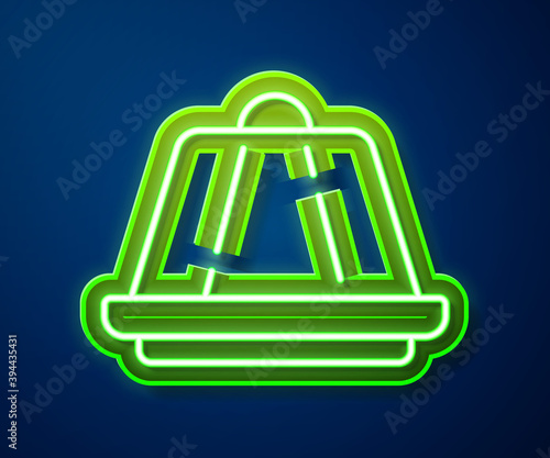 Glowing neon line Pudding custard with caramel glaze icon isolated on blue background. Vector.