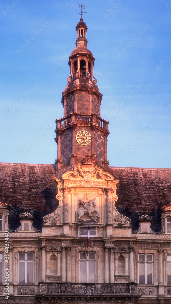 Reims central city hall tower with a clock, Champagne region, France