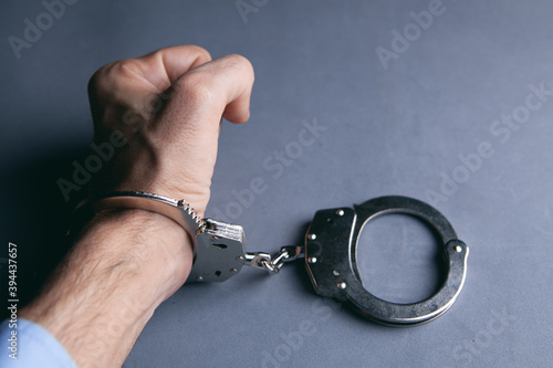 men handcuffed in criminal concept photo