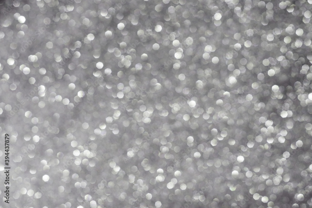 Christmas bokeh effect. Abstract texture of silvery color. Christmas bokeh effect. Abstract texture of silvery color.