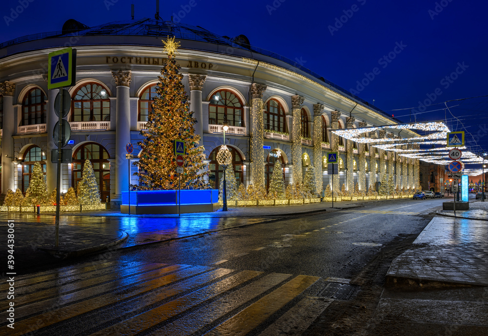 Night view of Old Merchant Court (Gostinyi dvor) in Moscow, Russia. Architecture and landmarks of Moscow. Moscow with Christmas decoration.