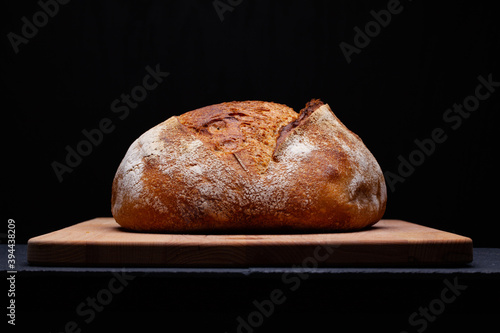 Artisan sourdough bread. on the black background.