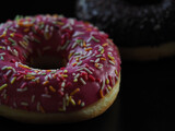 pink doughnut on a dark background