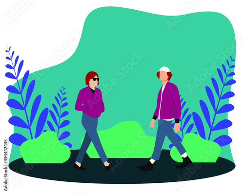 Boy and girl walking in the park and garden