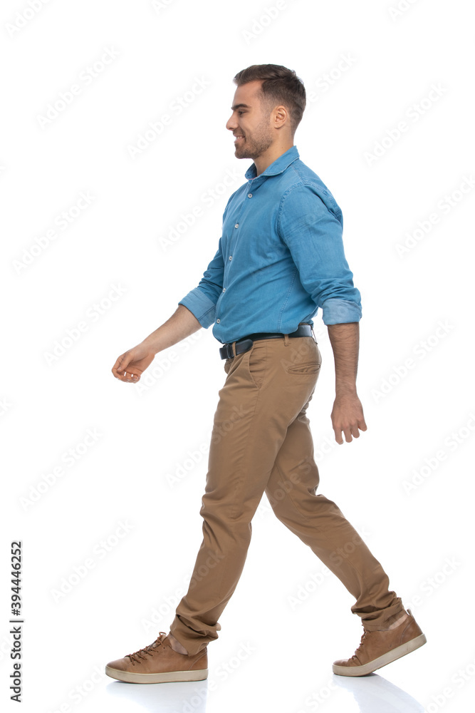 young casual man just walking on his path young casual man just walking on his path