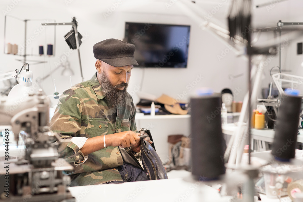 Man working in workshop, Sweden