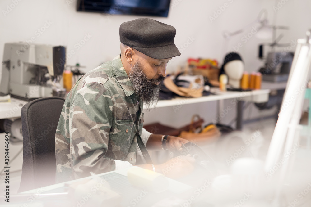 Man working in workshop, Sweden Man working in workshop, Sweden