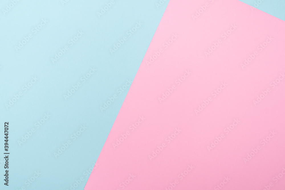 Composition with two color paper blue and pink, pastel tone, lay out with space for text Composition with two color paper blue and pink, pastel tone, lay out with space for text