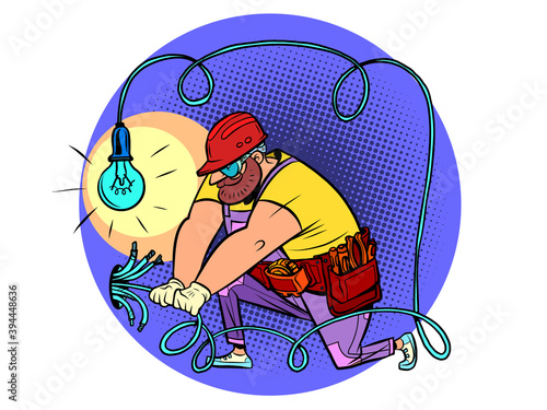 The electrician lays the wires