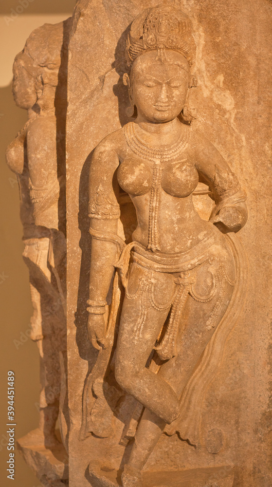 Bas-relief with dancing Apsara, or Surasundari at famous ancient Shree Eklingnath temple near Udaipur in Rajasthan, India
