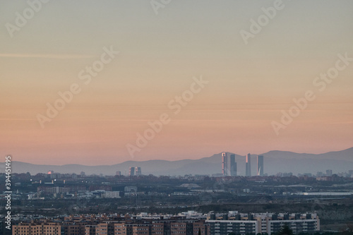 The Madrid Skyline and the Sierra de Guadarrama National Park seen from Cerro del Tel  grafo. Madrid s community. Spain