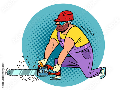 A carpenter with a chain saw