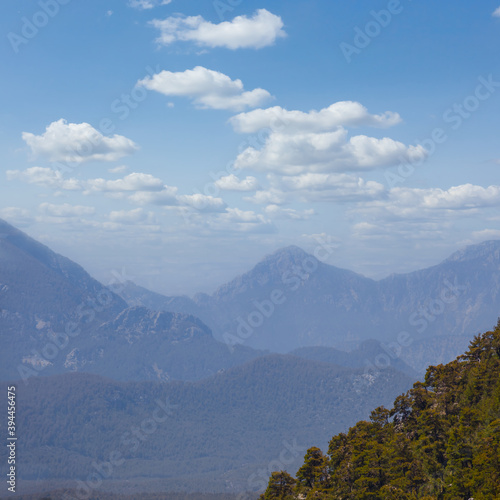 mountain valley in a blue mist, natural travel background