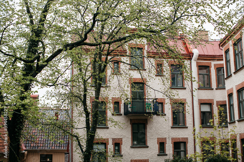 Wallpaper Mural Tree in front of block of flats, Sweden Torontodigital.ca