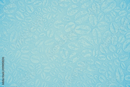 Light blue shabby texture background with coffee beans pattern