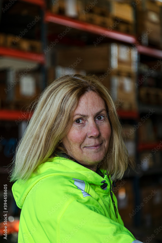Woman wearing reflective jacket, Sweden Woman wearing reflective jacket, Sweden