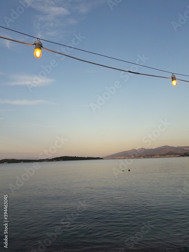 sunset over the river and lights