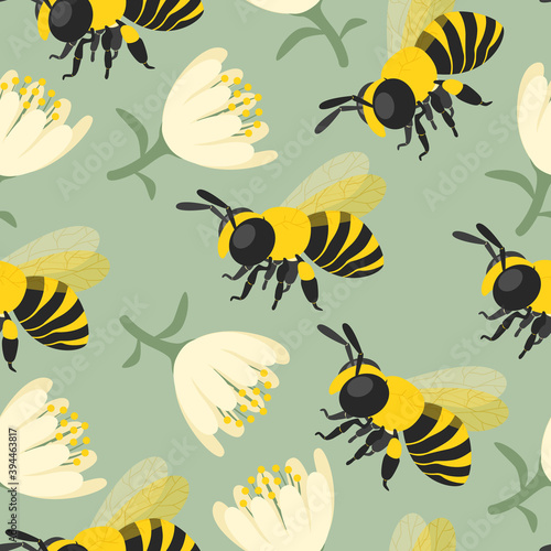 vector bees and flower seamless pattern on green