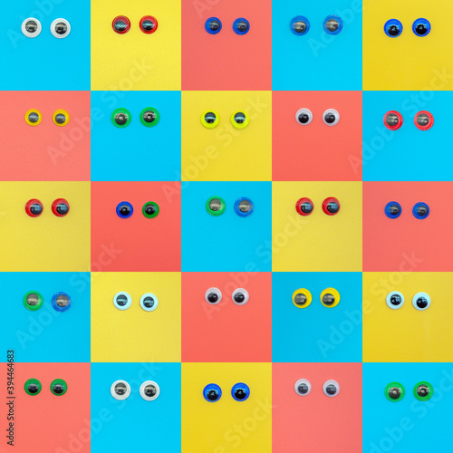 various eyes of different colors on different colored background