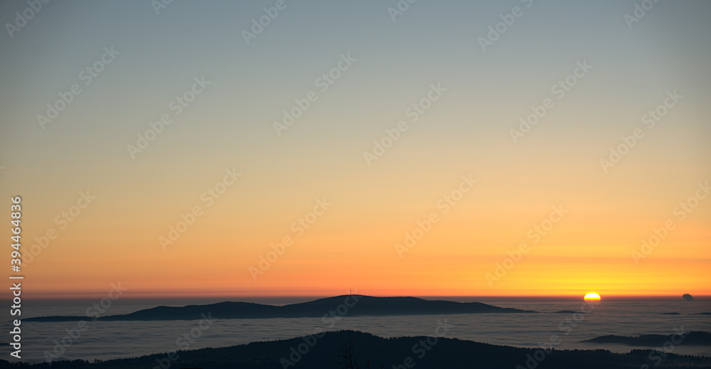 Fototapeta premium Sunset over foggy Germany