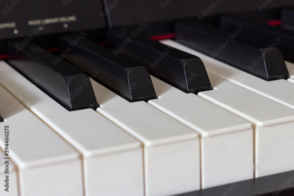 Close-up of electronic piano keys.