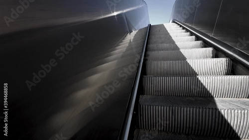 The escalator goes up. From a first person perspective