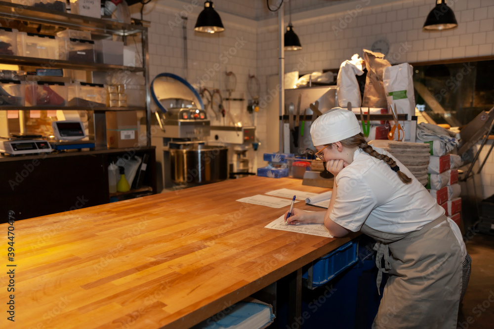 Female baker in bakery, Sweden Female baker in bakery, Sweden