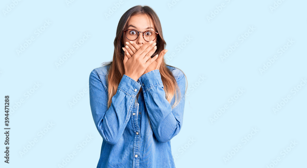 Beautiful caucasian woman wearing casual clothes and glasses feeling unwell and coughing as symptom for cold or bronchitis. health care concept. Beautiful caucasian woman wearing casual clothes and glasses feeling unwell and coughing as symptom for cold or bronchitis. health care concept.