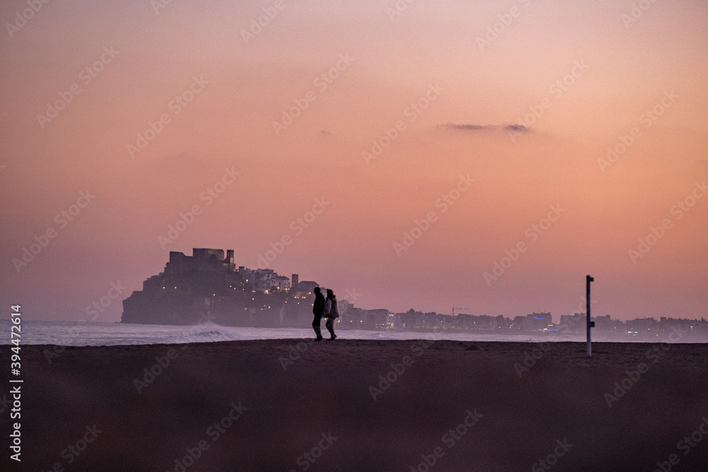 
Sunset landscape on the beach with silhouette of Pope Moon's castle
