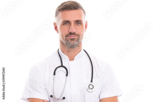 smiling mature man therapist doctor with unshaven face in medical suit and stethoscope care your health isolated on white, medicine