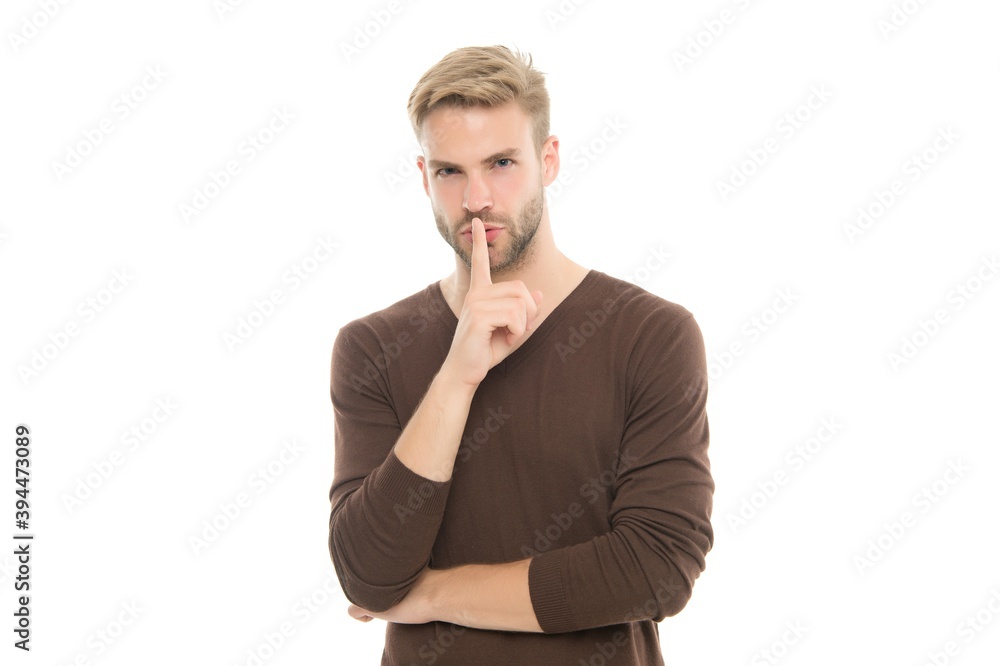 charismatic man has trendy hairstyle. Guy wear casual outfit. hush gesture. keep a secret. confident bearded guy. Beard grooming in hairdresser. Well groomed handsome man. styles of male clothes