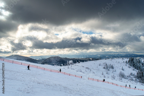 Skiing on mountain Zakhar Berkut, Carpathian mountains in Slavske, Ukraine on January 1, 2020. 