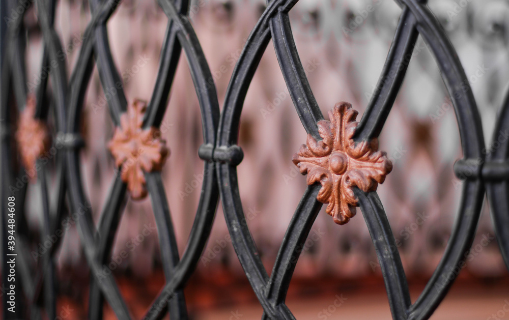 Closeup of fancy Black and Gold Stair Railing Panels for Interior Terrace.
Intricate iron handrailing in house. Closeup of fancy Black and Gold Stair Railing Panels for Interior Terrace.
Intricate iron handrailing in house.